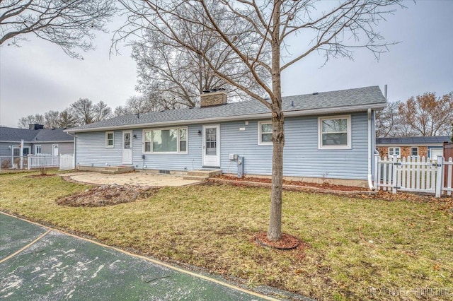 ranch-style home with a patio and a front yard