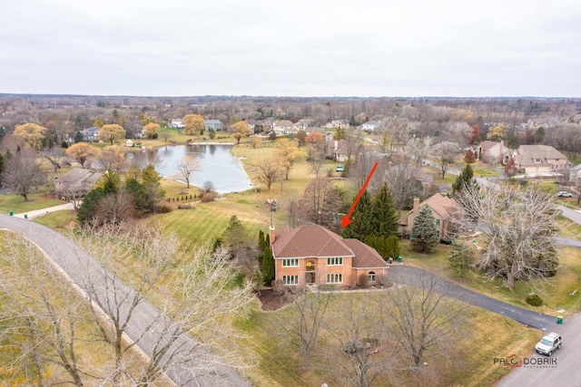 bird's eye view with a water view