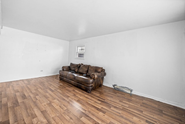 living room with light hardwood / wood-style flooring