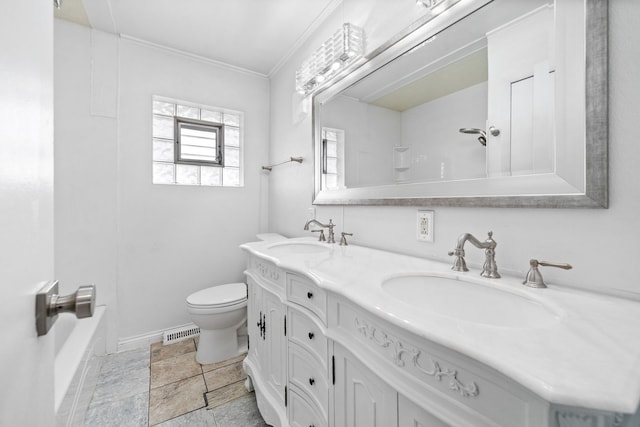 full bathroom with vanity, toilet, ornamental molding, and washtub / shower combination