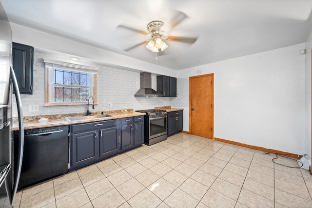 kitchen featuring ceiling fan, sink, wall chimney exhaust hood, light tile patterned flooring, and appliances with stainless steel finishes