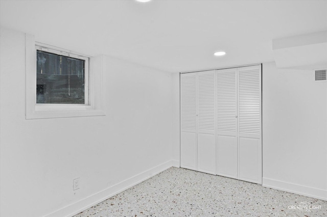 unfurnished bedroom featuring a closet