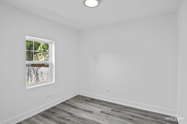 empty room featuring hardwood / wood-style floors