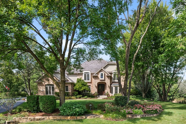 view of front of home with a front yard