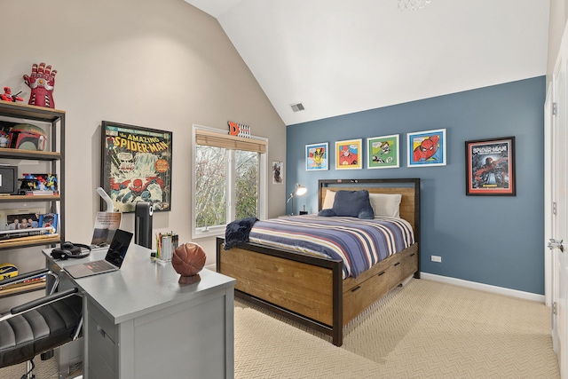 bedroom with light colored carpet and high vaulted ceiling