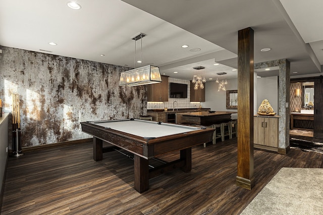 playroom with dark wood-type flooring, billiards, and wet bar