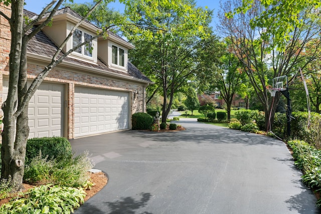 view of side of property featuring a garage