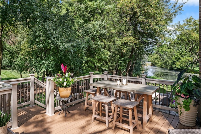 deck featuring a water view