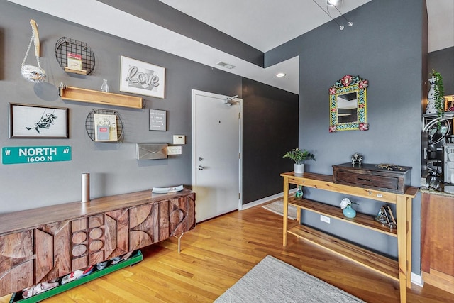 interior space with hardwood / wood-style floors