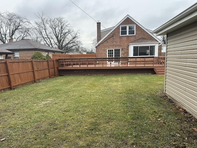 view of yard featuring a wooden deck