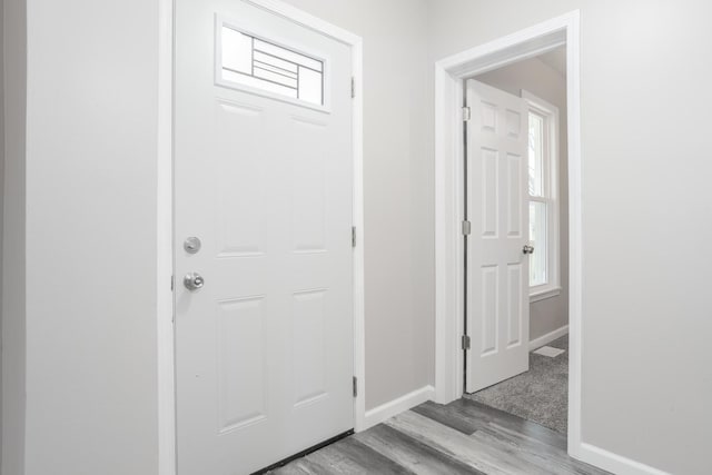 foyer entrance featuring light wood-type flooring