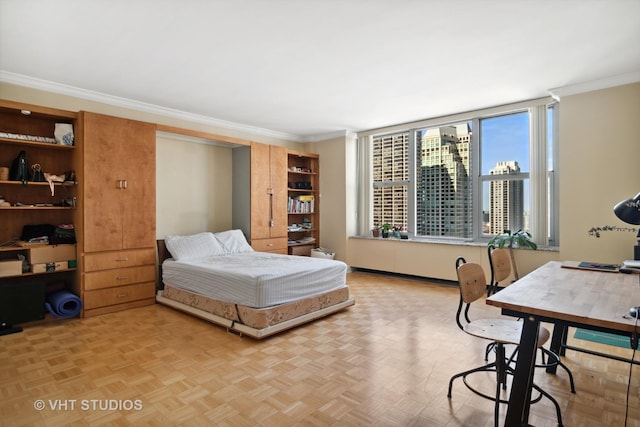 bedroom featuring parquet floors and crown molding