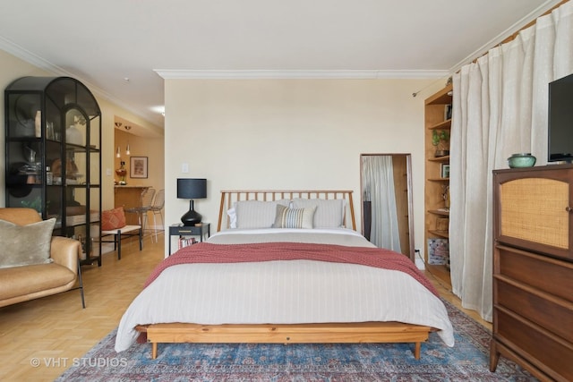 bedroom featuring crown molding and parquet flooring