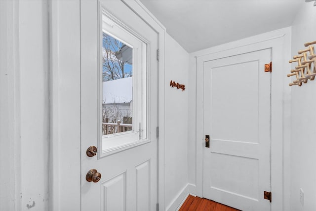 doorway with light hardwood / wood-style floors