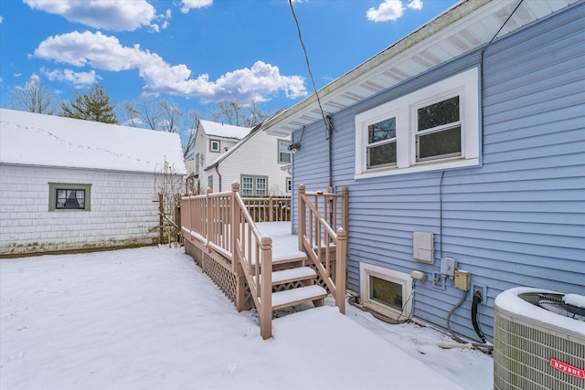 exterior space with cooling unit and a deck