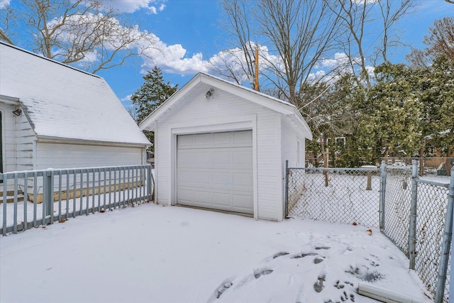 view of snow covered garage