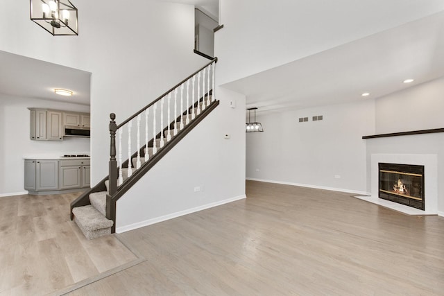 unfurnished living room featuring light wood-type flooring