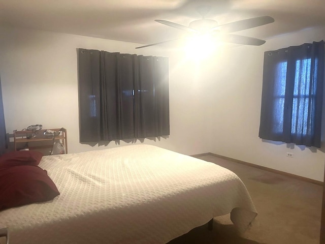 bedroom with carpet flooring and ceiling fan