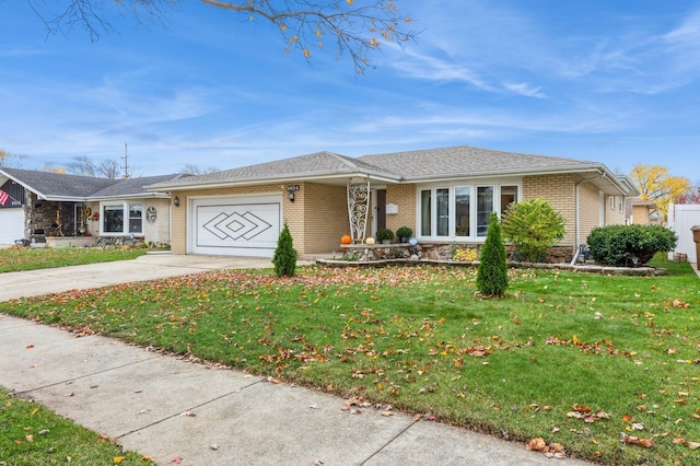 ranch-style home featuring a garage and a front lawn