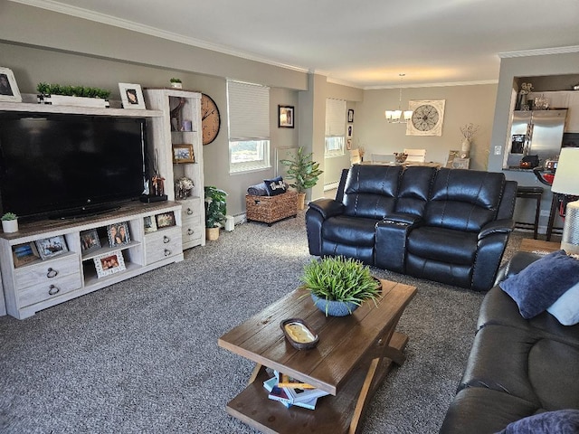 living room featuring baseboard heating, ornamental molding, a notable chandelier, and dark colored carpet