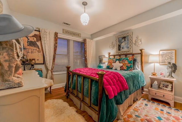 bedroom featuring hardwood / wood-style flooring