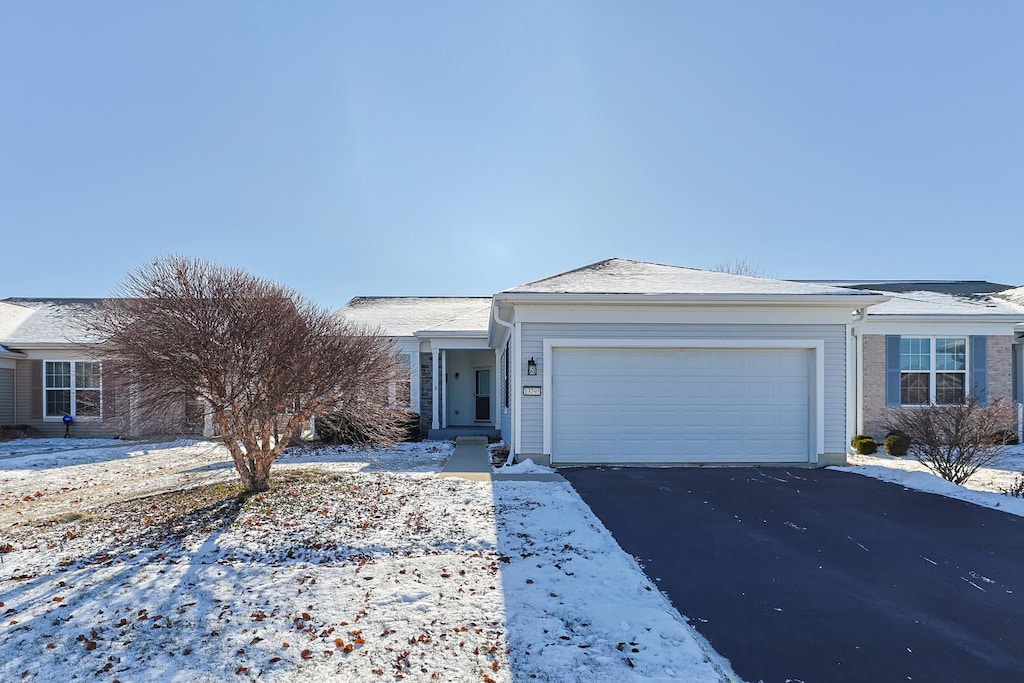 single story home with a garage