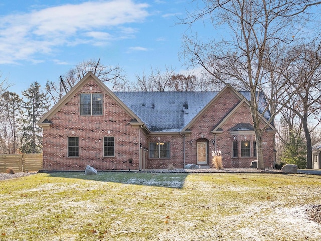 view of property featuring a front yard