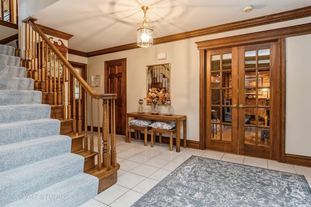 interior space featuring crown molding and french doors