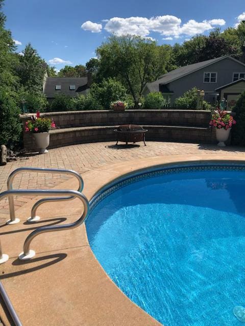 view of pool with a patio