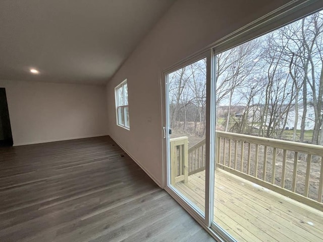 unfurnished living room with hardwood / wood-style flooring