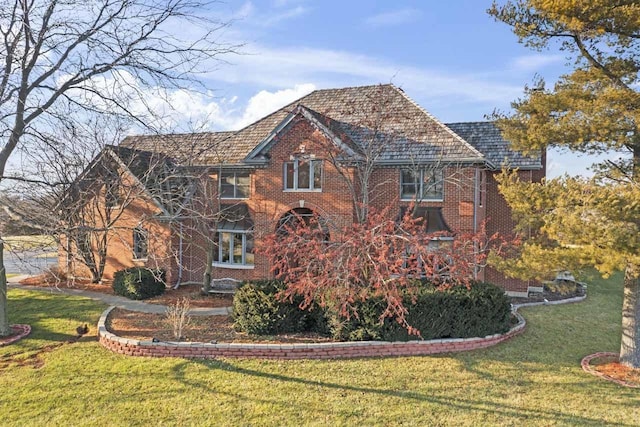 view of front of house with a front lawn