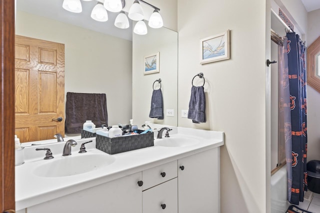 bathroom featuring vanity and shower / bathtub combination