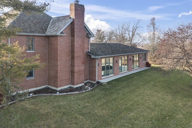 view of home's exterior featuring a lawn