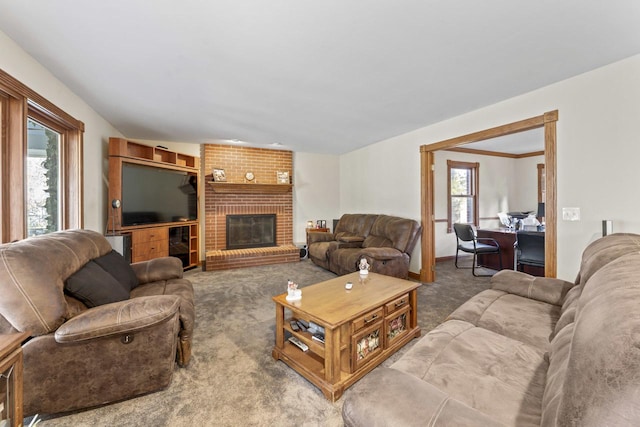 carpeted living room featuring a fireplace