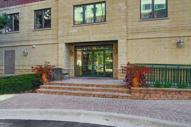 entrance to property featuring french doors