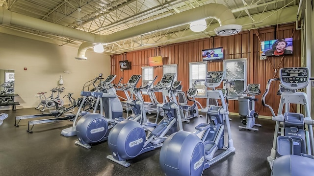 workout area with wooden walls