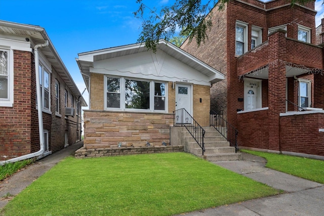 view of front of property with a front lawn