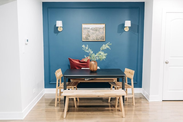 dining area featuring wood-type flooring