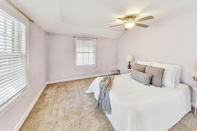 bedroom featuring light colored carpet, ceiling fan, and lofted ceiling