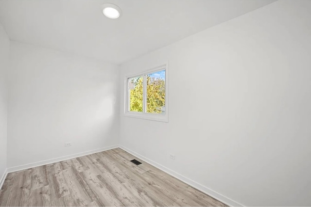 empty room featuring light hardwood / wood-style floors