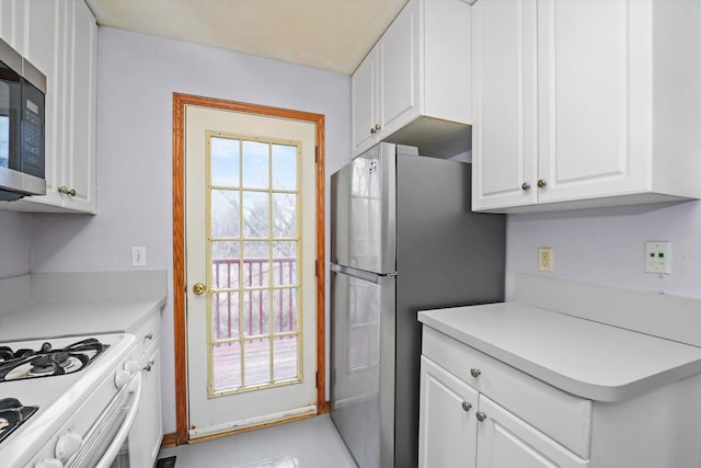 kitchen with white cabinets and stainless steel appliances