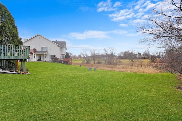 view of yard with a deck