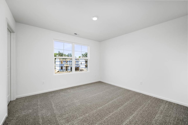 view of carpeted spare room