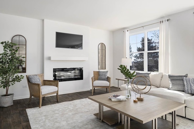 living room with dark hardwood / wood-style flooring