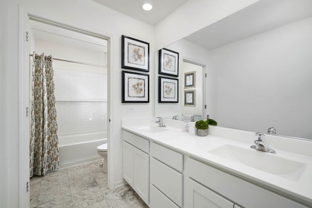 full bathroom featuring vanity, toilet, and shower / bath combo with shower curtain