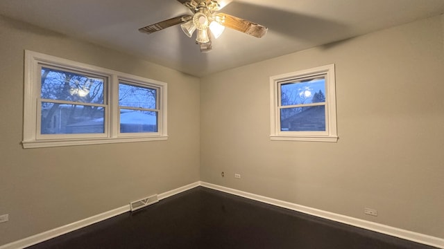 empty room featuring ceiling fan