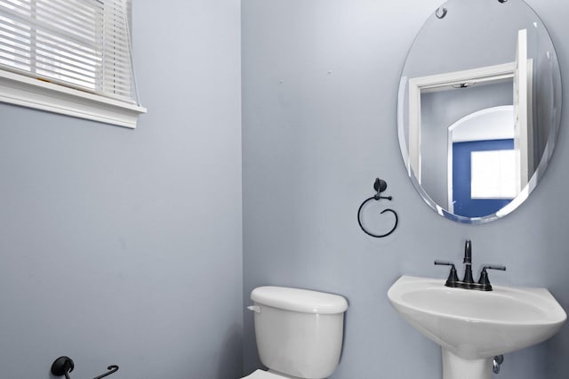 bathroom with sink and toilet