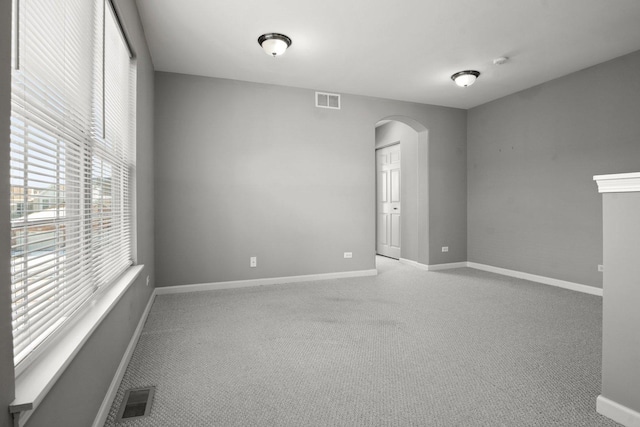 empty room featuring carpet flooring