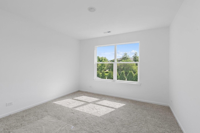 view of carpeted spare room