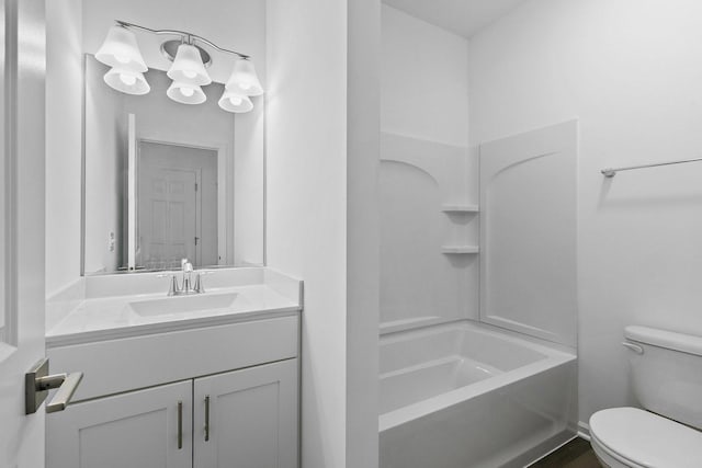 full bathroom featuring shower / tub combination, vanity, and toilet